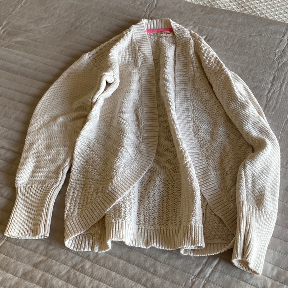 Girls’s cream/off white cardigan size 10/12.